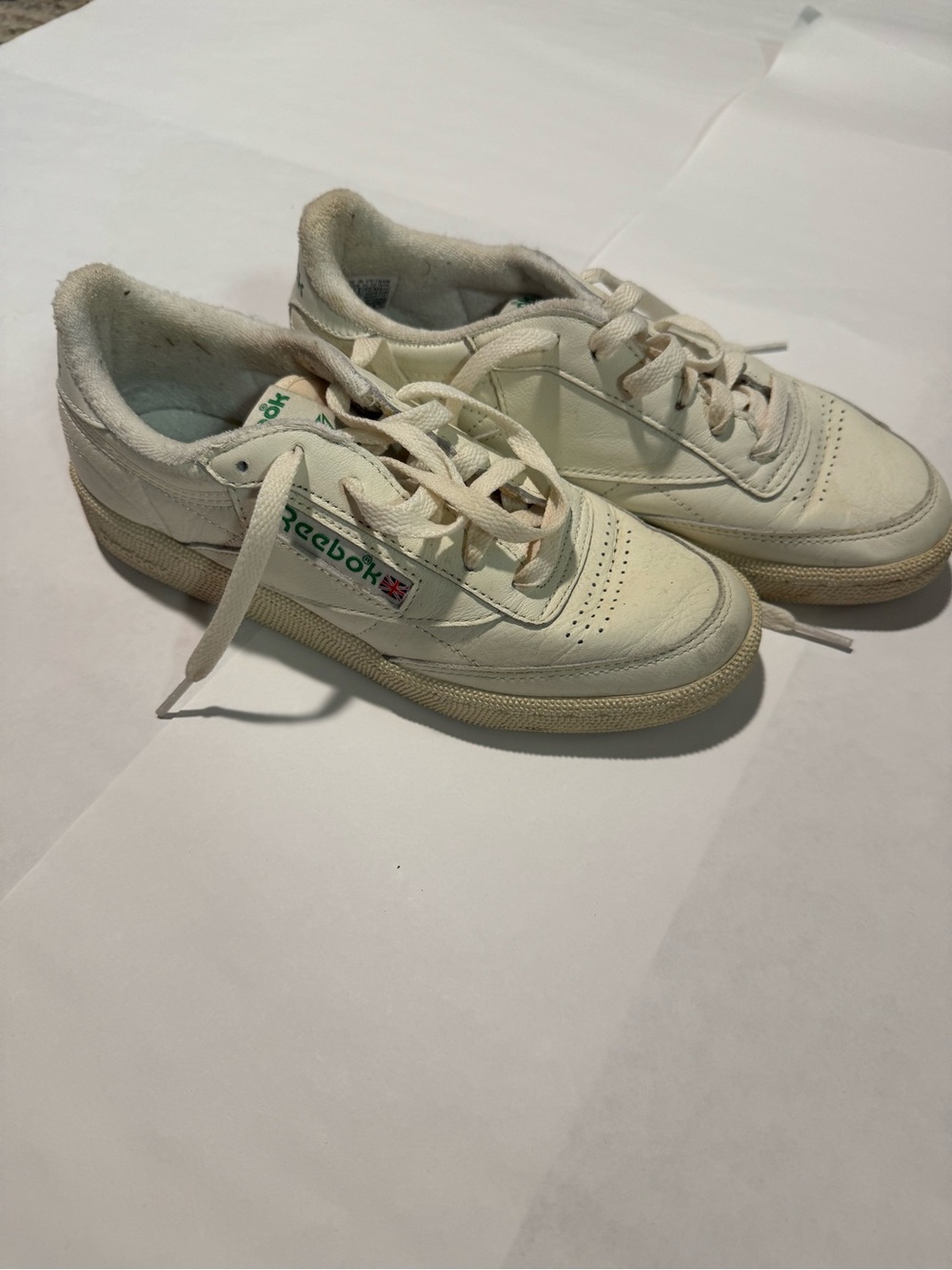 Reebok Women’s White Leather Sneakers with Green Logo Accent